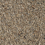 A close-up view of a large pile of small, irregularly shaped stone gravel in various shades of brown, gray, and beige, covering the entire image.