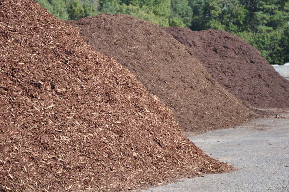 two-piles-of-different-types-of-mulch